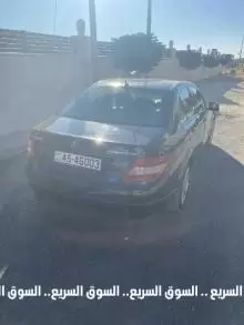 مرسيدس c200 2009 كرت ابيض 7 جيد